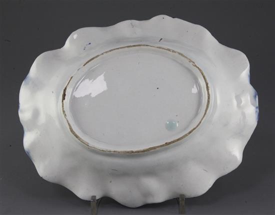 A Bow fruiting vine moulded blue and white oval dish, c.1765-70, 26cm